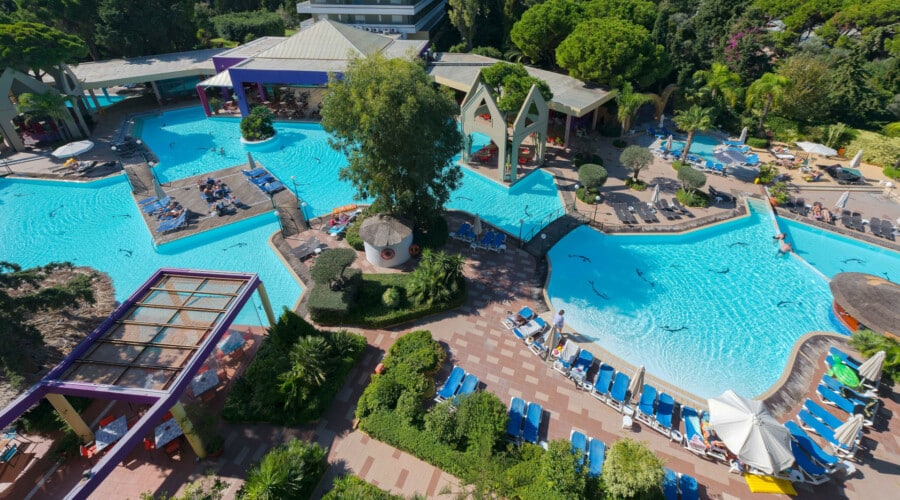 Aerial view of the seawater lagoon pools at Dionysos Hotel, a 4 star hotel in Ixia Rhodes