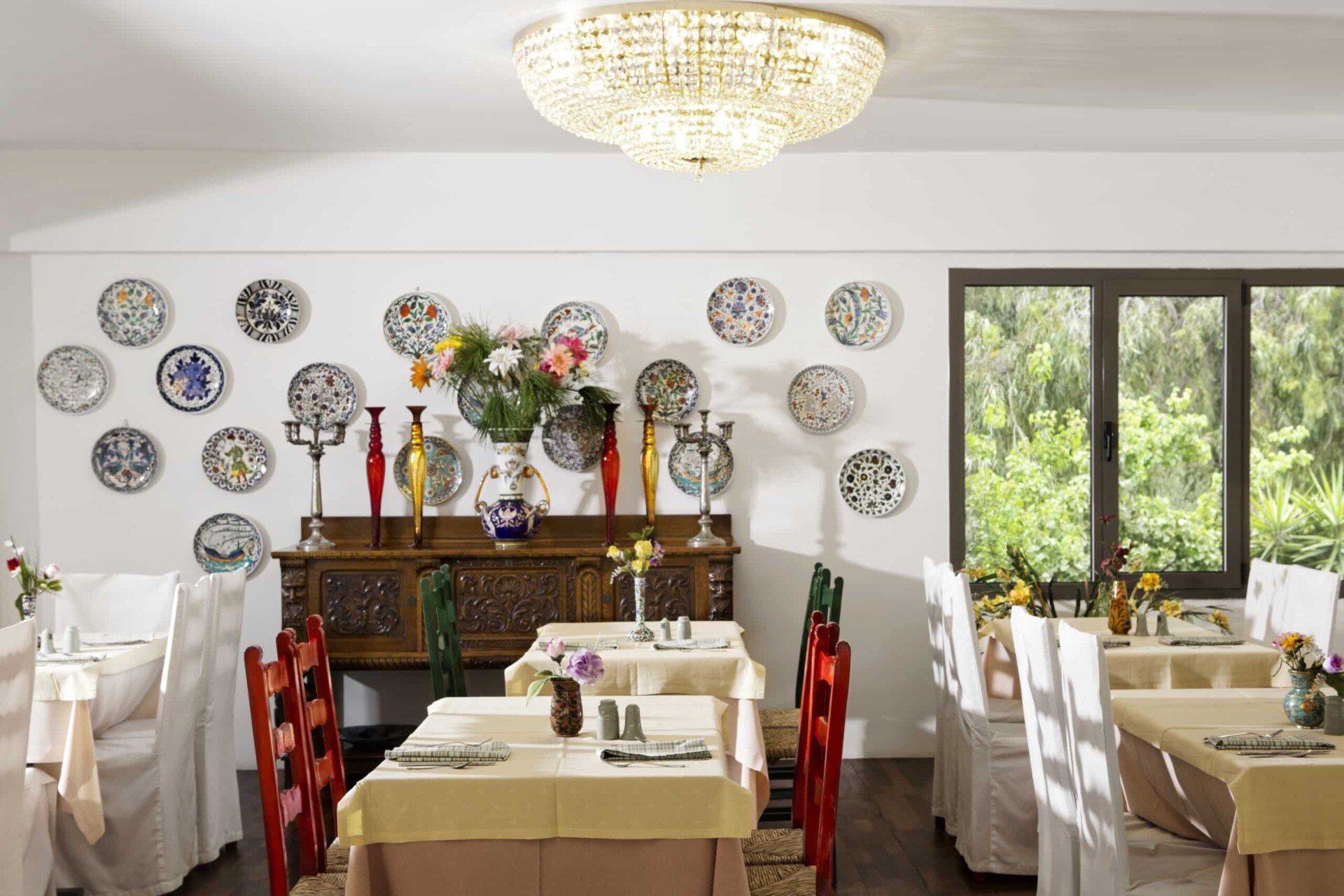 Indoor table set at Ambrosia Restaurant, Dionysos Hotel.